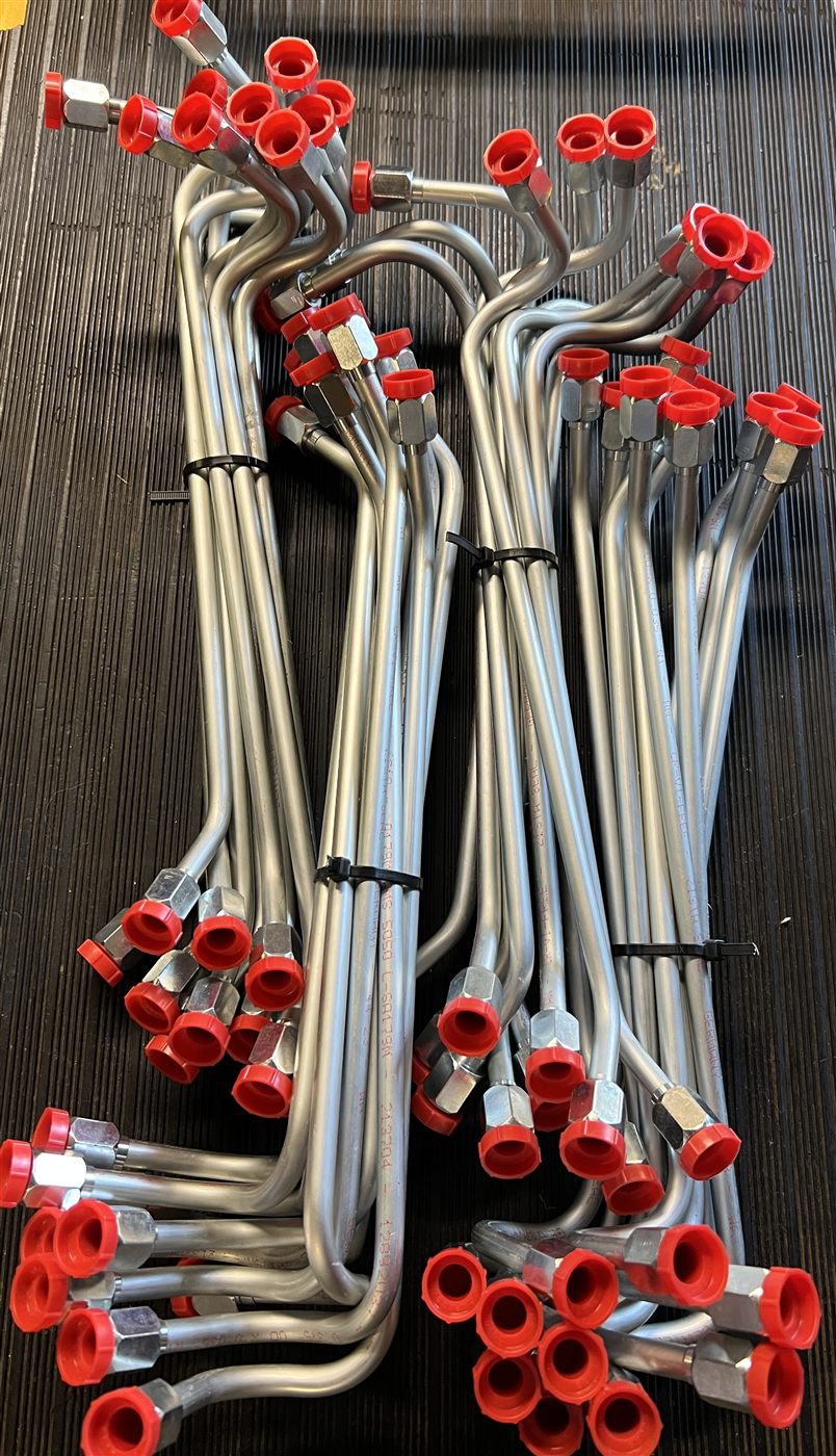 Production batch of bent JIC hydraulic tubing at Bending Dynamics