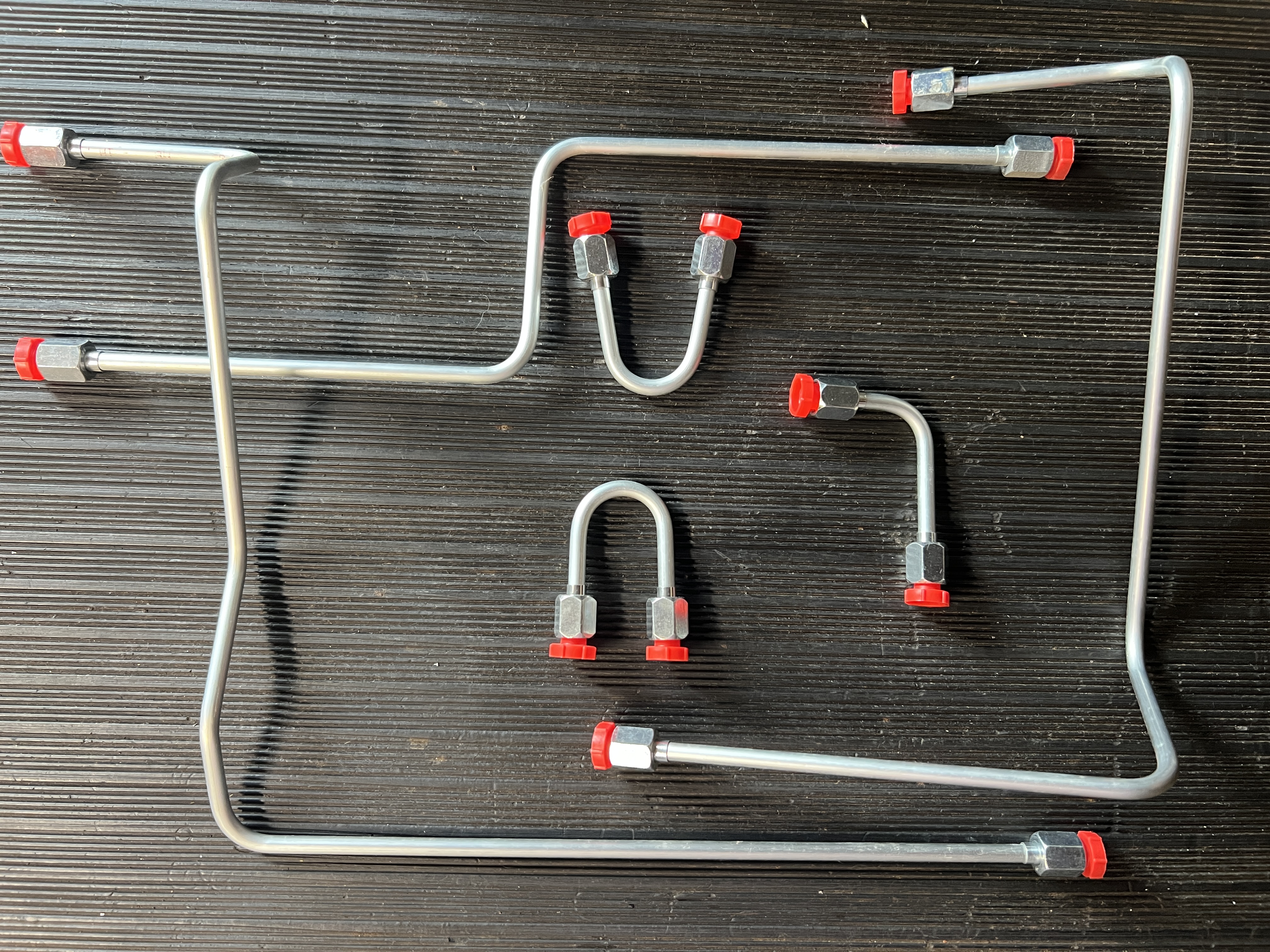 Finished small-diameter JIC hydraulic tube parts at Bending Dynamics